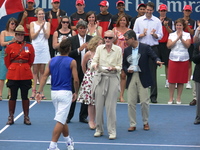 Ted Rogers giving a winner cheque to Rafael Nadal.