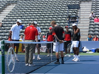 Dlouhy,  Paes, Bhuphathi, Knowles, coin toss. 