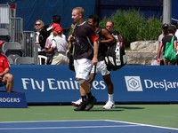 Lukas Dlouhy and Leander Paes, partners playing doubles