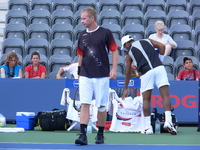 Lukas Dlouhy and Leander Paes before doubles match. 